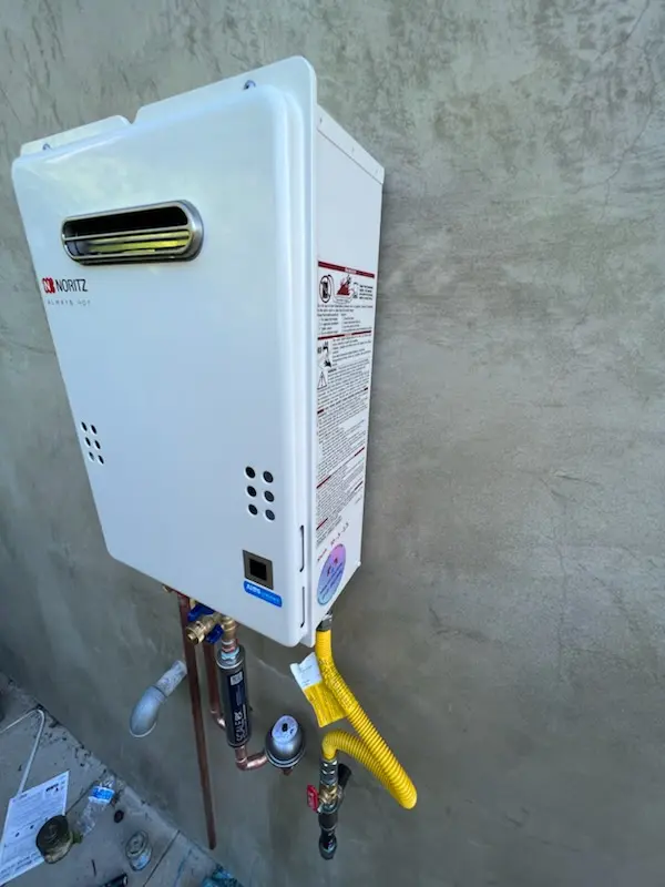 Tankless water heater installation for Flora homes